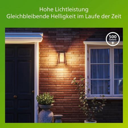 Philips Solar Wandleuchte Lysin in Schwarz mit Bewegungssensor UltraEfficient in klassischer Laternenform - 2700K warmweißes Licht, austauschbare Solarlampe